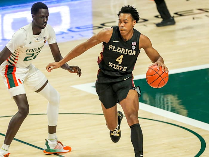 Florida State's Scottie Barnes dribbles